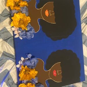 Twin black girls painting